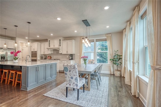 1703 Stevensan, Franklin Park, PA 15143 - dining space with dark wood-style floors, recessed lighting, and baseboards