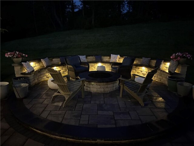 1703 Stevensan, Franklin Park, PA 15143 - patio at night featuring a fire pit and a patio