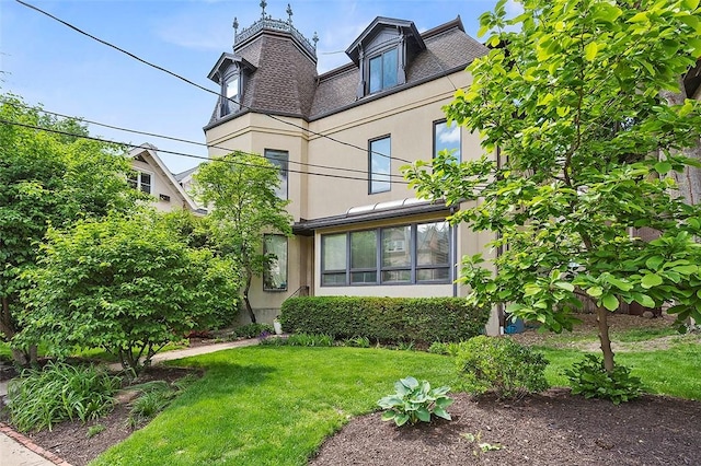 6015 Walnut St Unit 201, Shadyside, PA 15206 - back of property with a lawn, stucco siding, and a shingled roof