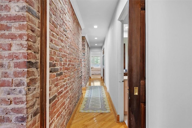6015 Walnut St Unit 201, Shadyside, PA 15206 - corridor with brick wall, light wood-style floors, baseboards, and recessed lighting