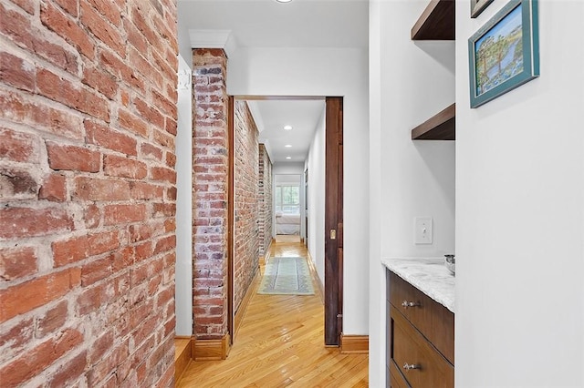 6015 Walnut St Unit 201, Shadyside, PA 15206 - hall featuring brick wall, light wood-type flooring, baseboards, and recessed lighting