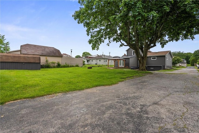 1218 W Ridge Ave, Sharpsville, PA 16150 - view of green lawn featuring a gazebo and a garage