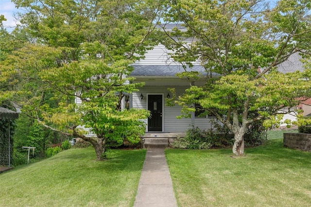 61 Ehle Ave, Kennedy Twp, PA 15108 - obstructed view of property featuring a front lawn
