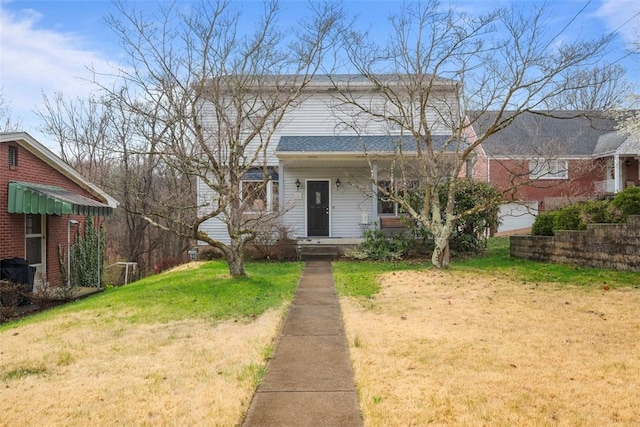 61 Ehle Ave, Kennedy Twp, PA 15108 - traditional-style home with a front lawn and covered porch