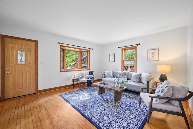 61 Ehle Ave, Kennedy Twp, PA 15108 - living area with healthy amount of natural light, light wood-type flooring, and baseboards