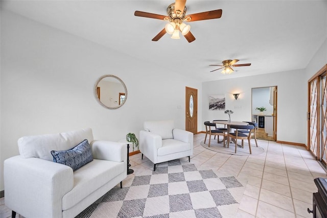 61 Ehle Ave, Kennedy Twp, PA 15108 - living room with baseboards, a ceiling fan, and light tile patterned flooring