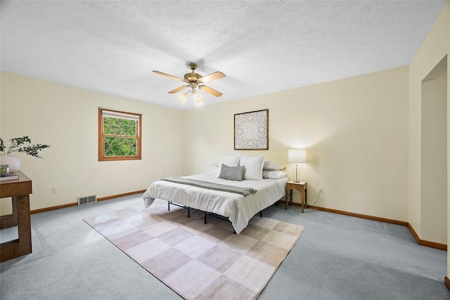 61 Ehle Ave, Kennedy Twp, PA 15108 - bedroom featuring carpet floors, baseboards, a ceiling fan, and a textured ceiling