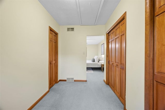 61 Ehle Ave, Kennedy Twp, PA 15108 - hall with attic access, light colored carpet, and baseboards