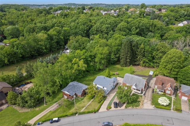 61 Ehle Ave, Kennedy Twp, PA 15108 - aerial view of property and surrounding area featuring a heavily wooded area and nearby suburban area