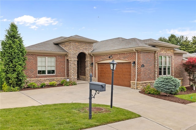 209 Lucca Ln, Upper St Clair, PA 15241 - view of front of home with concrete driveway, stone siding, a garage, and a shingled roof