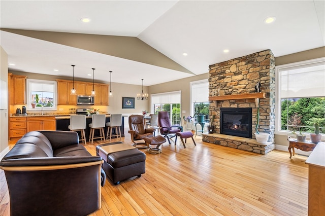 209 Lucca Ln, Upper St Clair, PA 15241 - living room featuring light wood-style flooring, plenty of natural light, lofted ceiling, a chandelier, and recessed lighting
