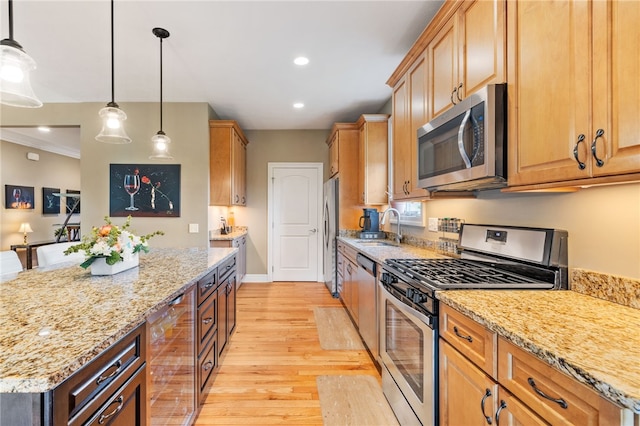 209 Lucca Ln, Upper St Clair, PA 15241 - kitchen with appliances with stainless steel finishes, light wood-style flooring, a sink, beverage cooler, and light stone counters