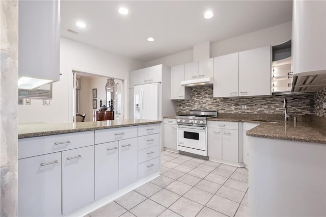 202 N Woodland Rd, Shadyside, PA 15232 - kitchen featuring range with gas cooktop, under cabinet range hood, white refrigerator with ice dispenser, white cabinets, and recessed lighting