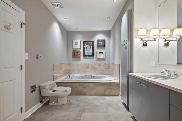 202 N Woodland Rd, Shadyside, PA 15232 - bathroom featuring a garden tub, vanity, marble look tile flooring, toilet, and baseboards
