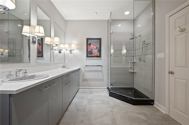 202 N Woodland Rd, Shadyside, PA 15232 - full bath with baseboards, a shower stall, double vanity, and recessed lighting