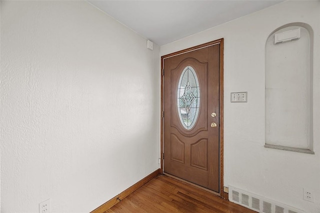 3353 Mcroberts Rd, Castle Shannon, PA 15234 - entryway with baseboards, wood finished floors, and arched walkways