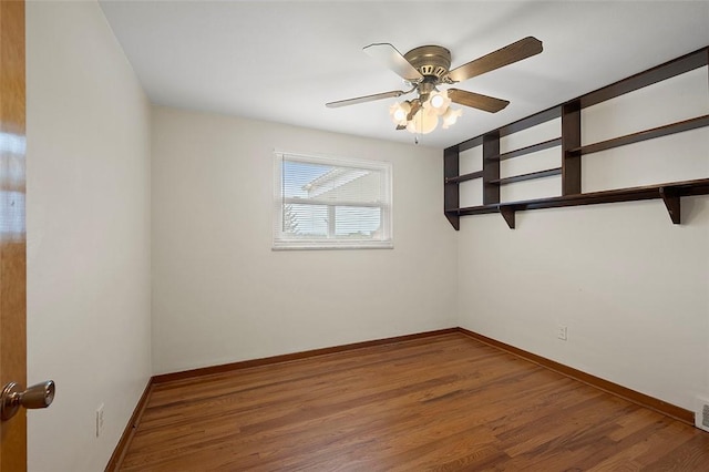 3353 Mcroberts Rd, Castle Shannon, PA 15234 - unfurnished room with baseboards, wood finished floors, and a ceiling fan