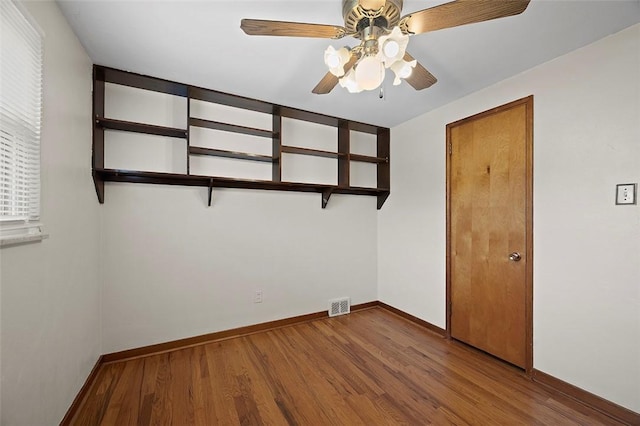 3353 Mcroberts Rd, Castle Shannon, PA 15234 - spare room with a ceiling fan, wood finished floors, and baseboards