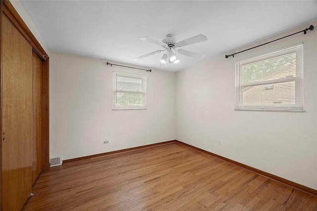 3353 Mcroberts Rd, Castle Shannon, PA 15234 - unfurnished bedroom featuring light wood finished floors, a closet, and baseboards