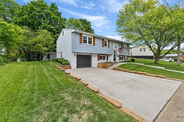 6003 Kingston Dr, Hopewell Twp Bea, PA 15001 - bi-level home with concrete driveway, an attached garage, and a front lawn