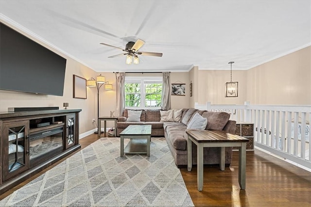 6003 Kingston Dr, Hopewell Twp Bea, PA 15001 - living room with ceiling fan, ornamental molding, dark wood-type flooring, a chandelier, and baseboards