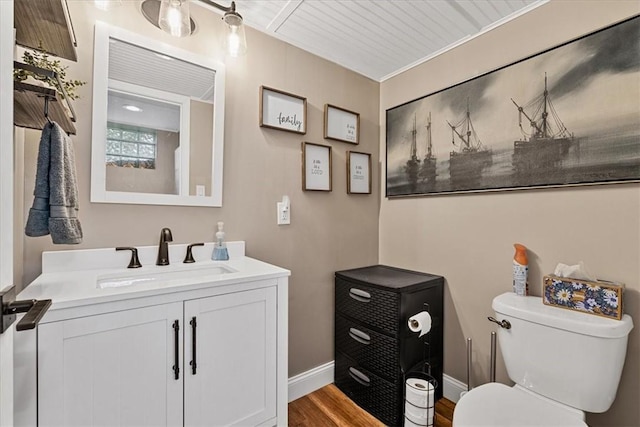 6003 Kingston Dr, Hopewell Twp Bea, PA 15001 - half bath with vanity, toilet, wood finished floors, and baseboards
