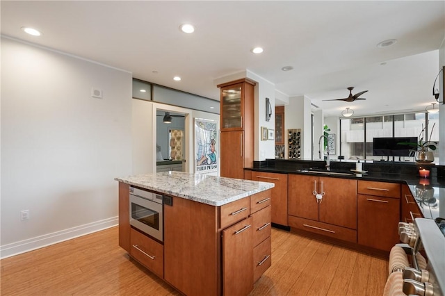 151 Fort Pitt Blvd Unit 1703, Downtown Pgh, PA 15222 - kitchen with appliances with stainless steel finishes, ceiling fan, light wood finished floors, a sink, and recessed lighting