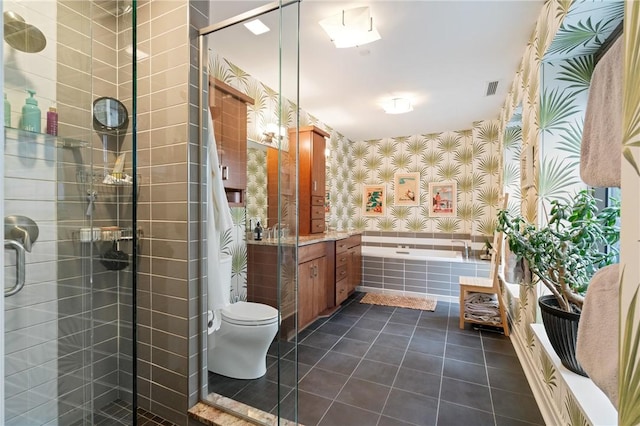 151 Fort Pitt Blvd Unit 1703, Downtown Pgh, PA 15222 - full bathroom featuring wallpapered walls, toilet, tile patterned floors, vanity, and a garden tub