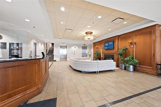 151 Fort Pitt Blvd Unit 1703, Downtown Pgh, PA 15222 - welcome area featuring stairs, recessed lighting, ornamental molding, and a fireplace