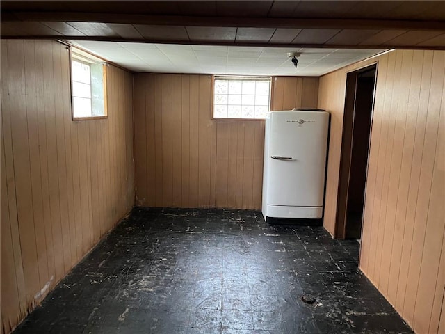 256 Vermont St, Hempfield Twp Wml, PA 15601 - below grade area featuring water heater, wooden walls, and tile patterned floors