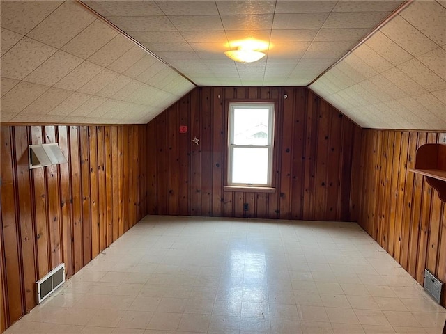 256 Vermont St, Hempfield Twp Wml, PA 15601 - additional living space featuring tile patterned floors, wooden walls, and lofted ceiling