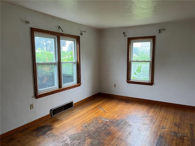 256 Vermont St, Hempfield Twp Wml, PA 15601 - empty room featuring wood-type flooring and baseboards