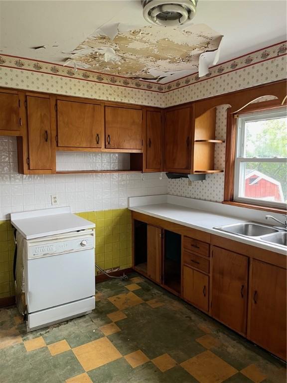 256 Vermont St, Hempfield Twp Wml, PA 15601 - kitchen featuring a sink, open shelves, light countertops, and brown cabinets