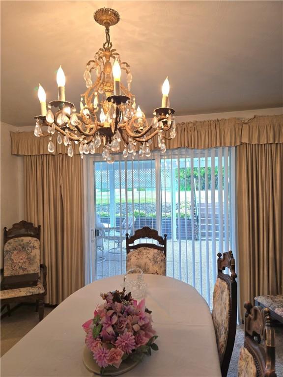 209 Pawnee St, Rostraver, PA 15012 - dining room with a chandelier