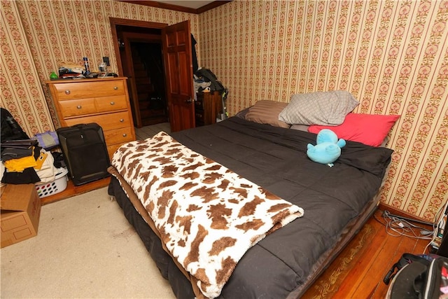 1019 Boulder St, California, PA 15419 - bedroom featuring wallpapered walls, light wood-style flooring, and crown molding