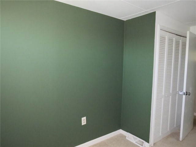 21 Daisytown Rd, W Pike Run Twp, PA 15427 - unfurnished bedroom featuring light colored carpet, a closet, and baseboards