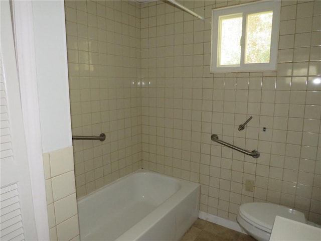 21 Daisytown Rd, W Pike Run Twp, PA 15427 - full bathroom featuring toilet, tile walls,  shower combination, and tile patterned floors