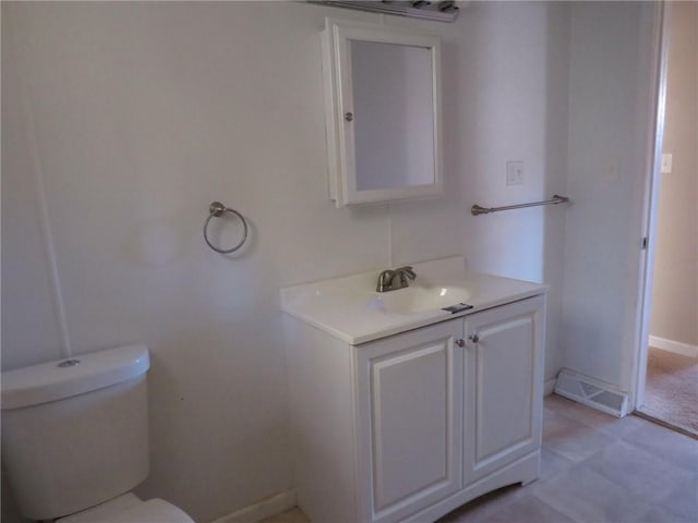 21 Daisytown Rd, W Pike Run Twp, PA 15427 - bathroom featuring vanity, toilet, and baseboards