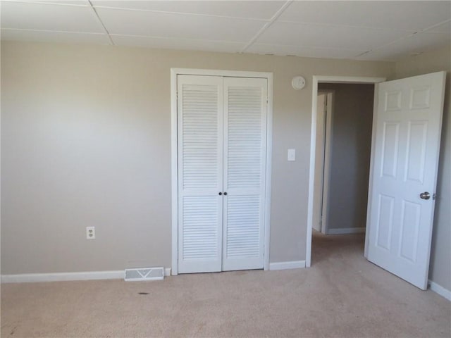 21 Daisytown Rd, W Pike Run Twp, PA 15427 - unfurnished bedroom with light colored carpet, a closet, baseboards, and a drop ceiling