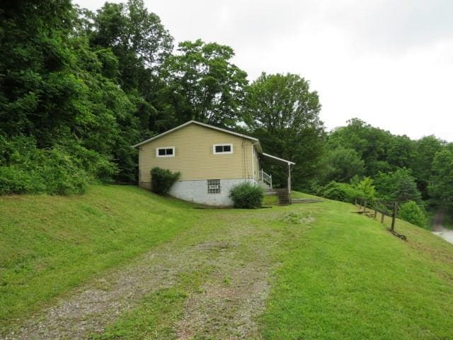 21 Daisytown Rd, W Pike Run Twp, PA 15427 - view of grassy yard featuring dirt driveway
