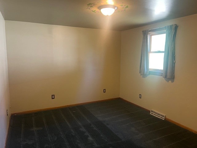 1320 High, Jefferson Hills, PA 15025 - empty room with dark colored carpet and baseboards