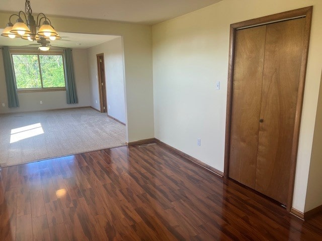 1320 High, Jefferson Hills, PA 15025 - spare room with a chandelier, wood finished floors, and baseboards