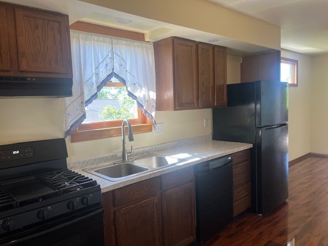 1320 High, Jefferson Hills, PA 15025 - kitchen with black appliances, under cabinet range hood, a sink, and light countertops