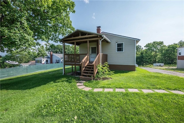 1320 High, Jefferson Hills, PA 15025 - view of front of house with a chimney, stairs, and a wooden deck