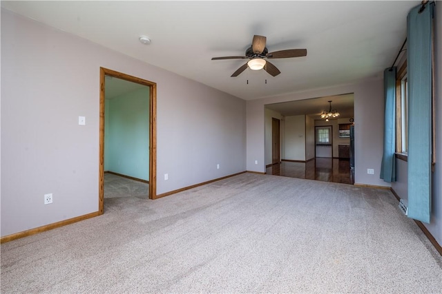 1320 High, Jefferson Hills, PA 15025 - empty room featuring carpet floors, a chandelier, a ceiling fan, and a smoke detector