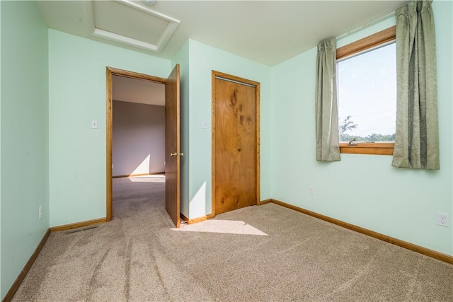 1320 High, Jefferson Hills, PA 15025 - unfurnished bedroom with attic access, carpet, and a closet