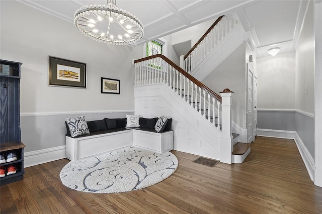 194 Beaver St, Beaver, PA 15009 - stairway with wood finished floors, baseboards, a chandelier, coffered ceiling, and ornamental molding