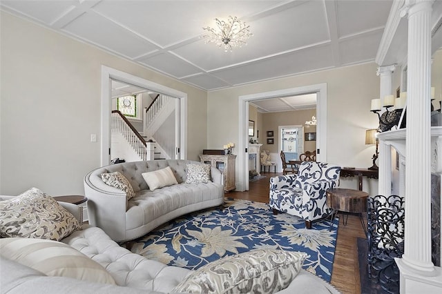 194 Beaver St, Beaver, PA 15009 - living area featuring coffered ceiling, wood finished floors, stairway, decorative columns, and a chandelier