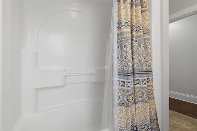 194 Beaver St, Beaver, PA 15009 - full bathroom featuring shower / bath combo, wood finished floors, and baseboards