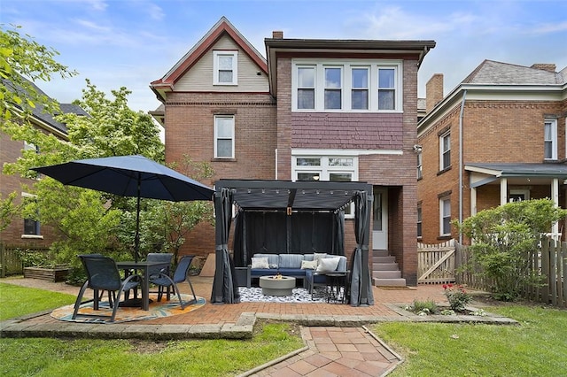 194 Beaver St, Beaver, PA 15009 - back of property featuring an outdoor living space, a patio, brick siding, and a gate